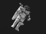 astronaut in white suit in grayscale photography
