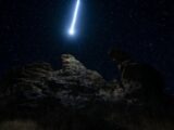 Majestic comet and starry night sky above dramatic rock formations in Durango, Mexico.
