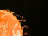 orange sun on black background