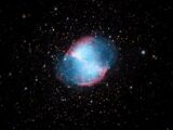Captivating image of the Dumbbell Nebula (M27) among a myriad of stars in deep space.