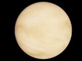 High-resolution image of planet Venus with its iconic cloudy atmosphere against a black space background.