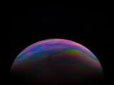 purple and blue planet with black background