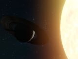A ringed planet silhouetted against a bright star in outer space.