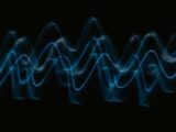 a black background with a blue wave of light