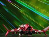 Red and white futuristic spaceship with engines