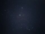 A clear view of the starry sky with bright stars scattered across the night.