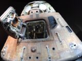 Close-up view of a NASA Apollo command module showcasing intricate details of space exploration technology.