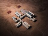 a group of trucks that are sitting in the dirt