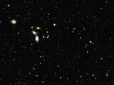 a cluster of stars in the night sky