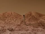 Astronaut in spacesuit explores barren, Mars-like desert terrain under brown sky.