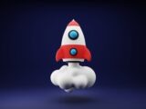 a red and white toy rocket on a blue background