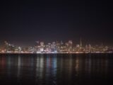 city skyline during night time