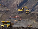 photography of excavators at mining area