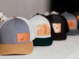 five assorted-color baseball caps