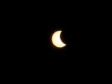 Captivating view of a partial solar eclipse captured in Mazatlán, Mexico, with a clear crescent shape.
