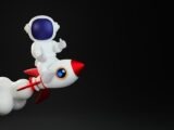 a toy is floating in the air on a rocket