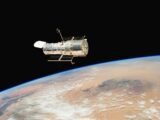 an image of a satellite above the earth