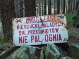 red and white wooden signage
