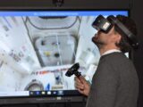 man playing VR goggles